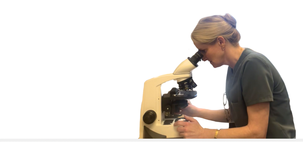 Dr. Ashley Decker reviewing a mohs slide in real time