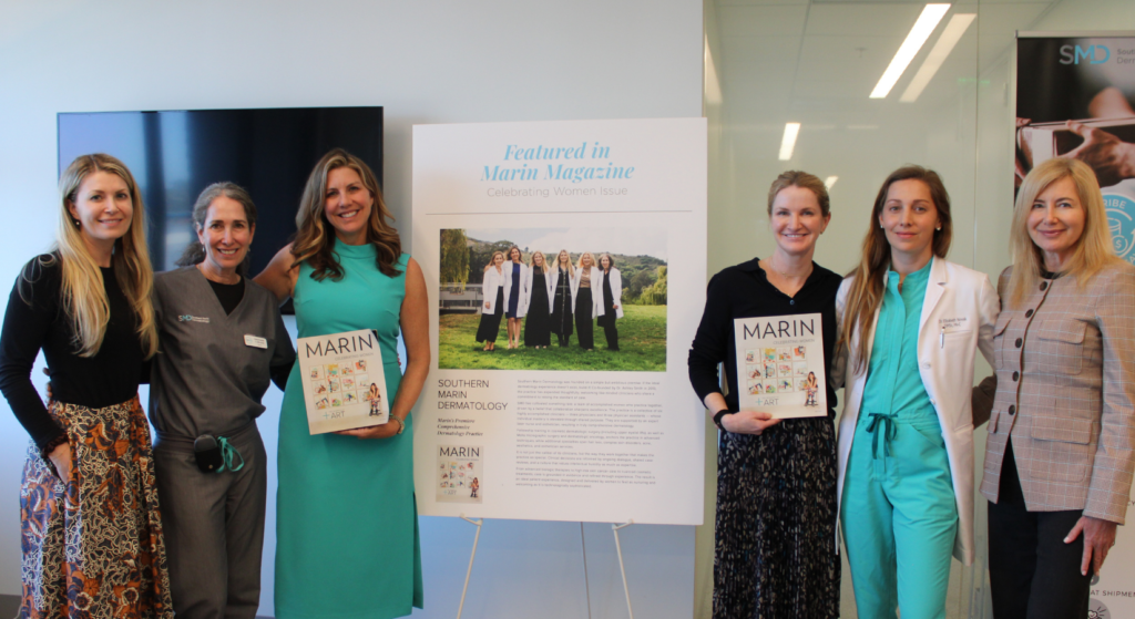 Dermatologists and Physician Assistants of Southern Marin Dermatology holding Marin Magazine's Celebrating Women Issue